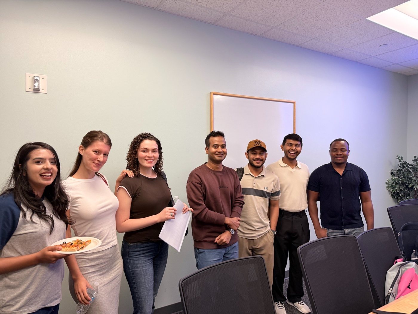 Md Jamil Hasan with fellow graduate students at Texas State University
